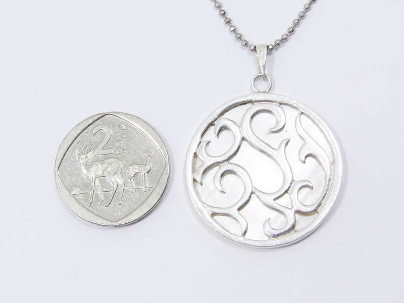 A Lovely Large Mother of Pearl Pendant on Chain in Sterling Silver