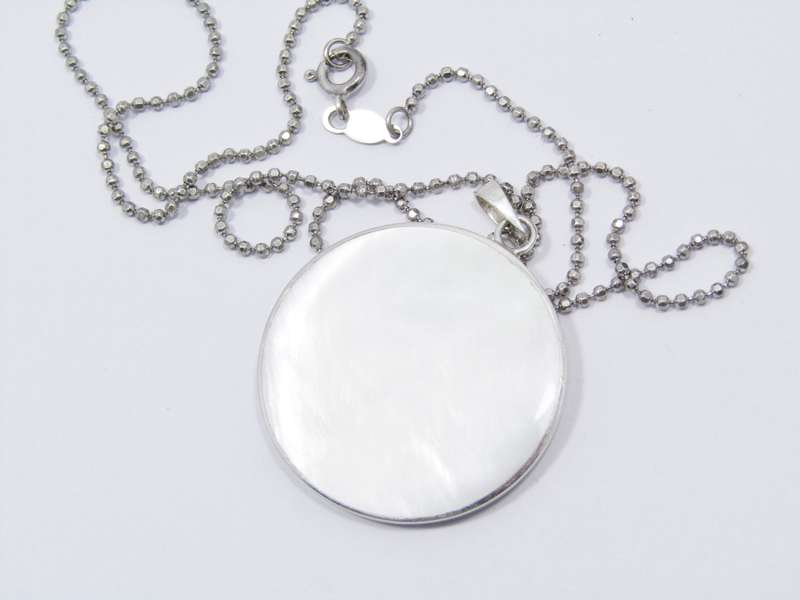 A Lovely Large Mother of Pearl Pendant on Chain in Sterling Silver