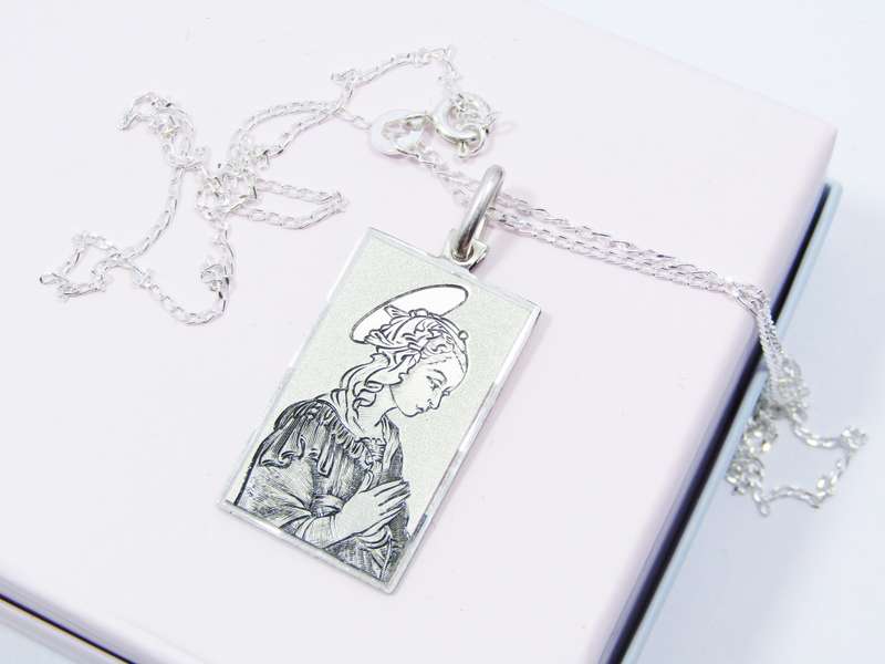 A Gorgeous Textured Madonna Engraved Pendant on Chain in Sterling Silver.
