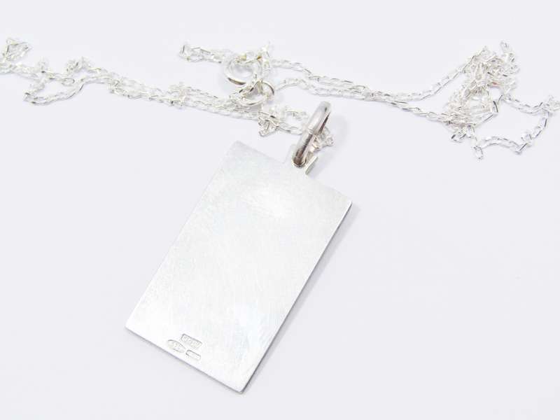 A Gorgeous Textured Madonna Engraved Pendant on Chain in Sterling Silver.