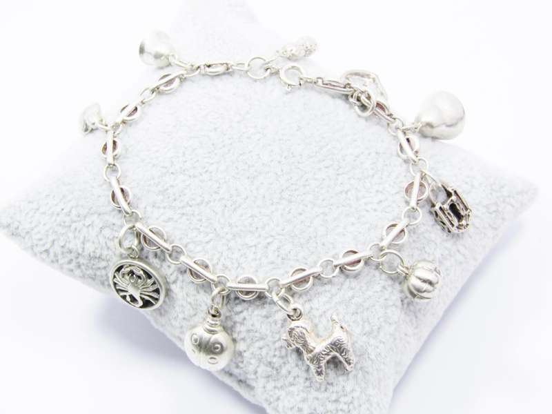 A Very Pretty Vintage Charm Bracelet in Sterling Silver