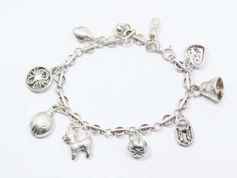 A Very Pretty Vintage Charm Bracelet in Sterling Silver