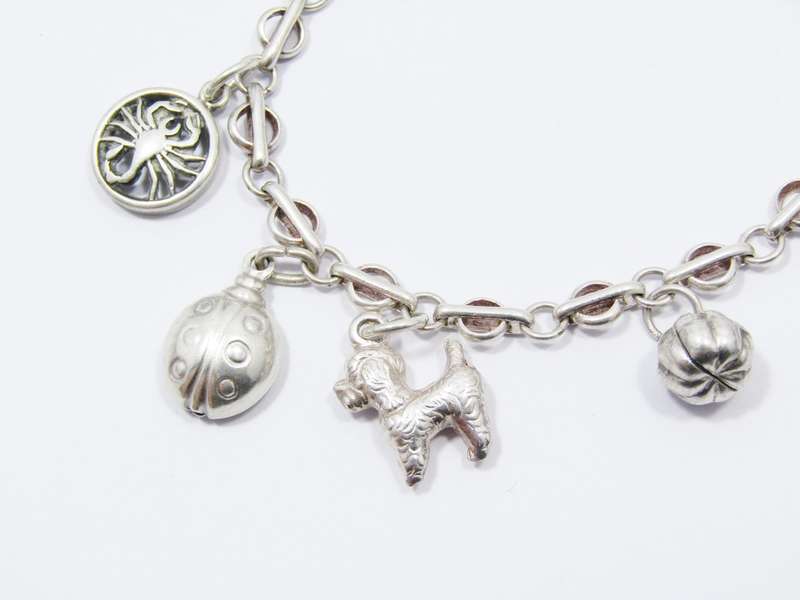 A Very Pretty Vintage Charm Bracelet in Sterling Silver