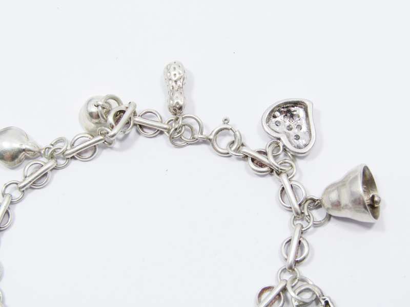 A Very Pretty Vintage Charm Bracelet in Sterling Silver