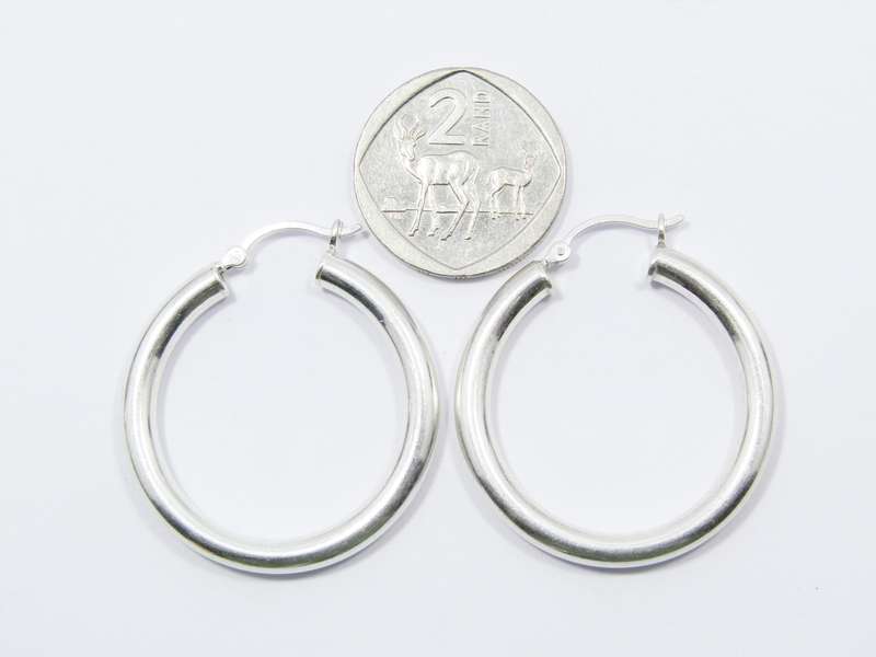 A Stunning Pair of Gypsy Hoop Earrings in Sterling Silver