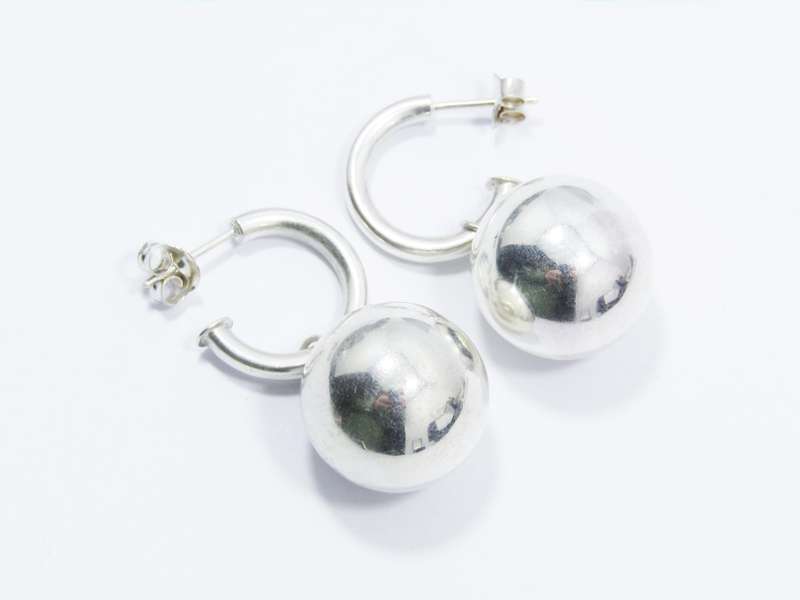 A Stunning Pair of hoop Ball Earrings in Sterling Silver.
