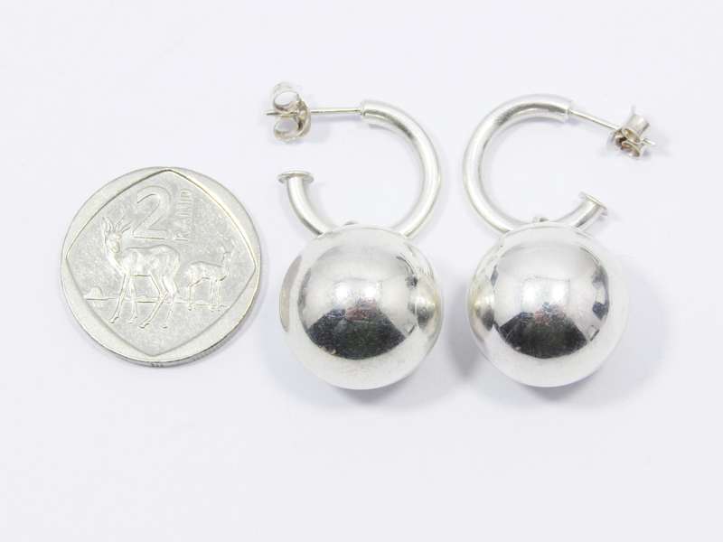 A Stunning Pair of hoop Ball Earrings in Sterling Silver.
