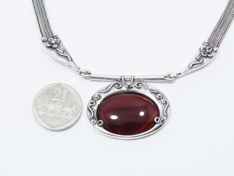A Gorgeous and Oh So Different Carnelian Belt Design Necklace in Sterling Silver.