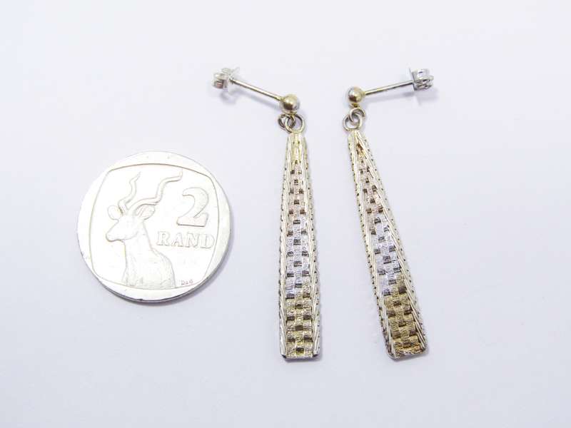 A Stunning Pair of Two Tone Dangling Earrings in a Gold Tone Over Sterling Silver
