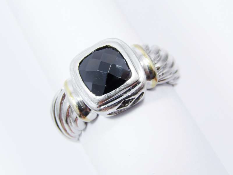 A Lovely Facetted Two Tone Black Stone ring in Sterling Silver.