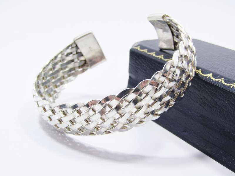 A Gorgeous Woven Cuff Bangle in Sterling Silver.