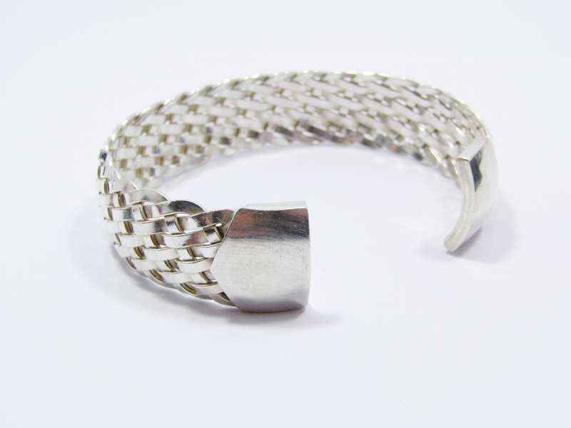 A Gorgeous Woven Cuff Bangle in Sterling Silver.
