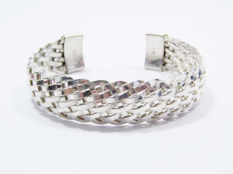 A Gorgeous Woven Cuff Bangle in Sterling Silver.