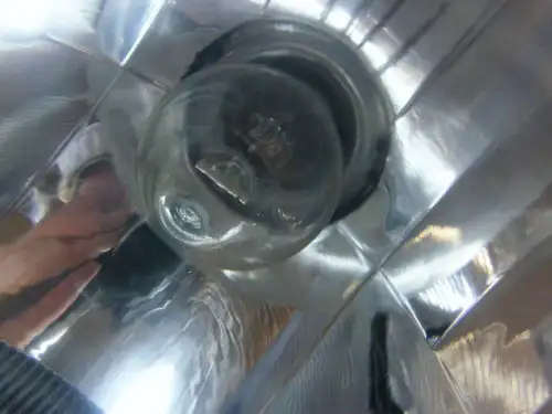 Front head light assembly for variety of 125cc, 150cc and 250cc sport style scooters