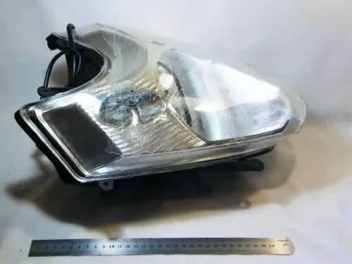 Front head light assembly for variety of 125cc, 150cc and 250cc sport style scooters