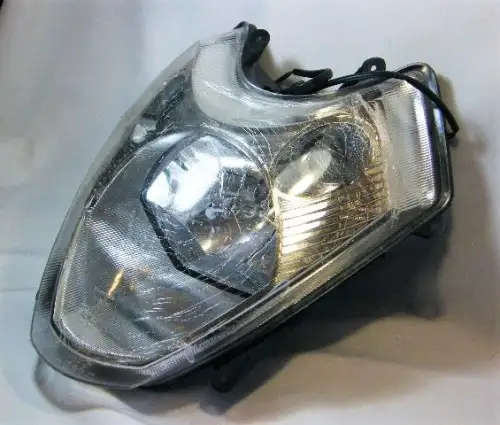 Front head light assembly for variety of 125cc, 150cc and 250cc sport style scooters