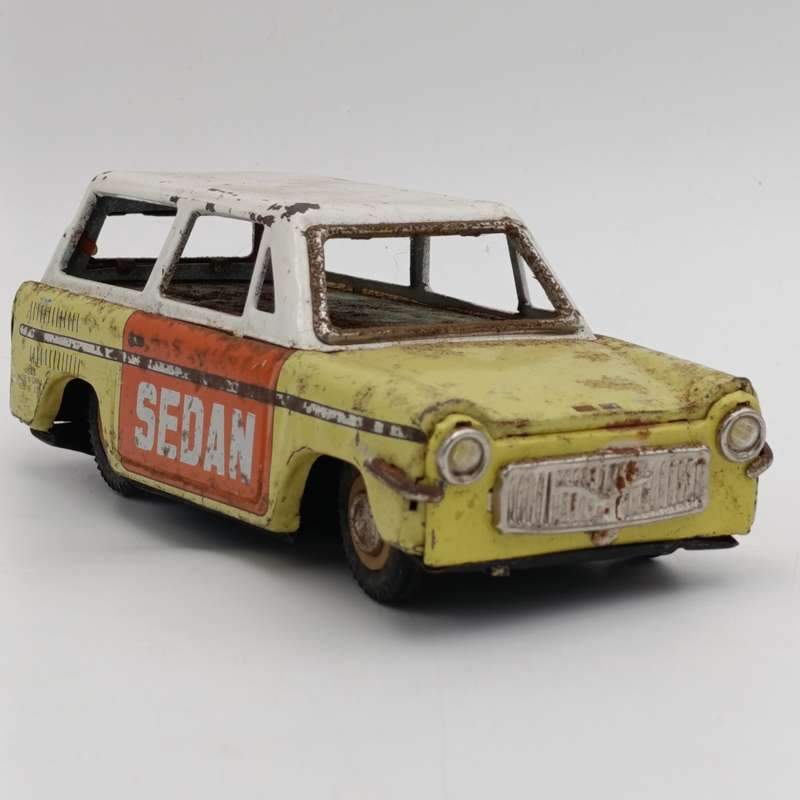 Vintage Chinese tinplate Sedan friction toy car