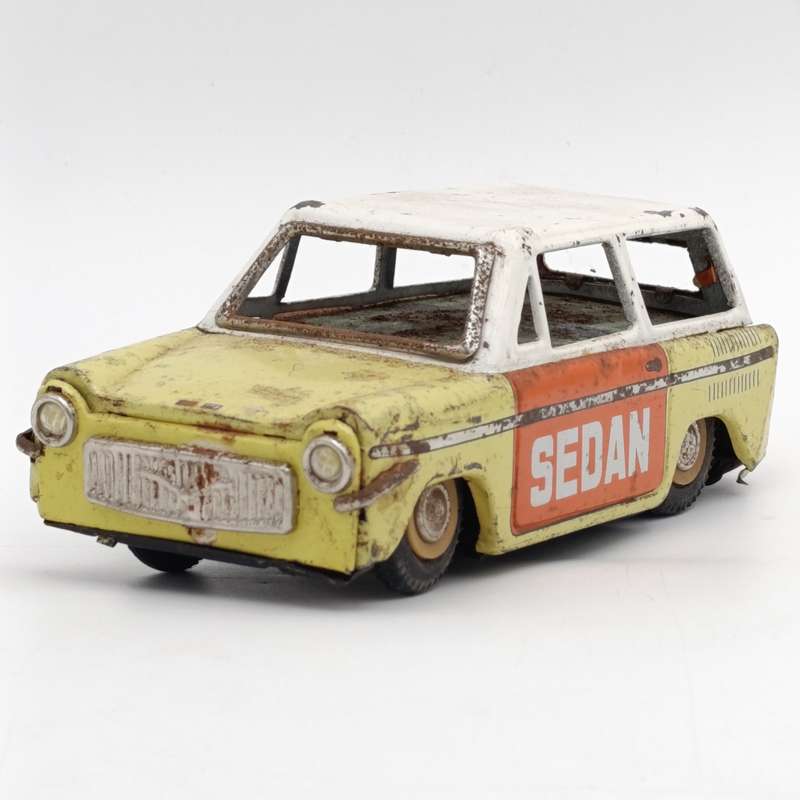 Vintage Chinese tinplate Sedan friction toy car