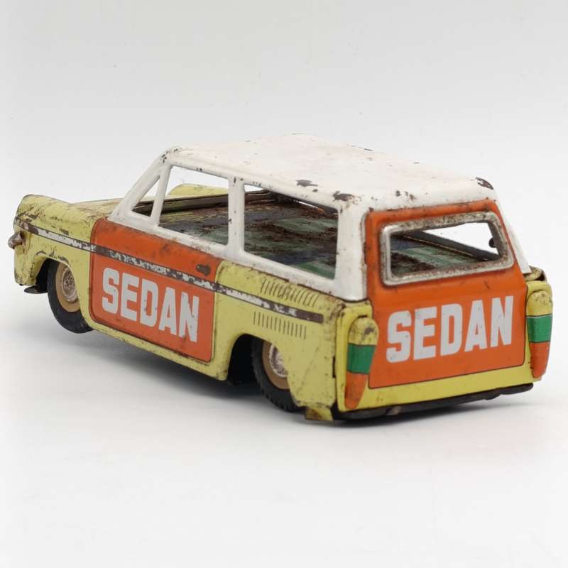 Vintage Chinese tinplate Sedan friction toy car