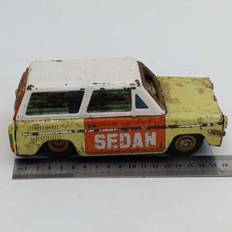 Vintage Chinese tinplate Sedan friction toy car
