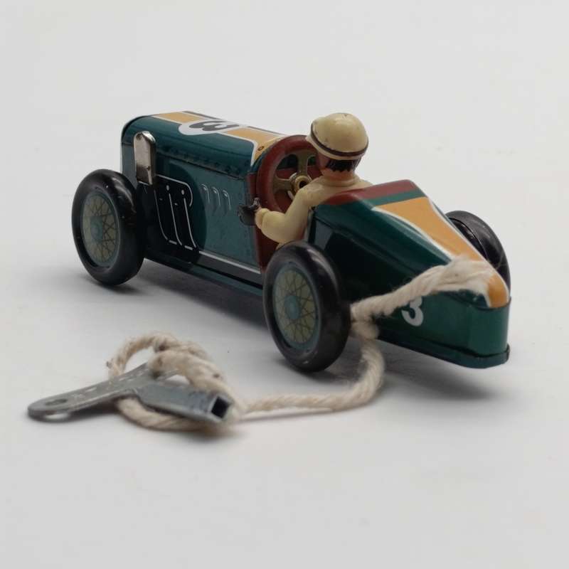 Vintage St John tinplate mechanical race car toy