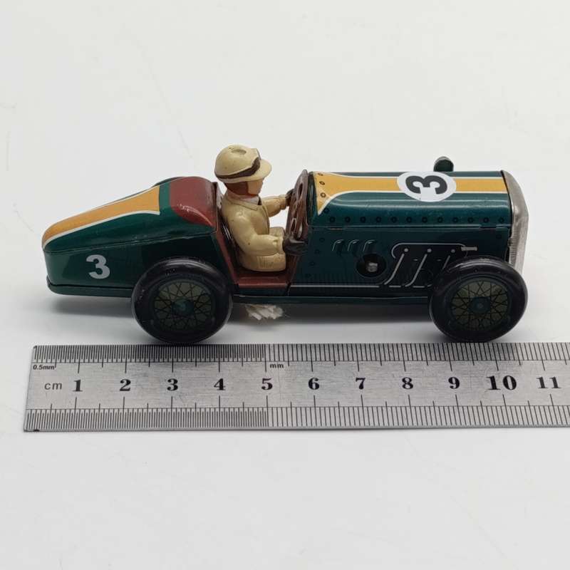 Vintage St John tinplate mechanical race car toy