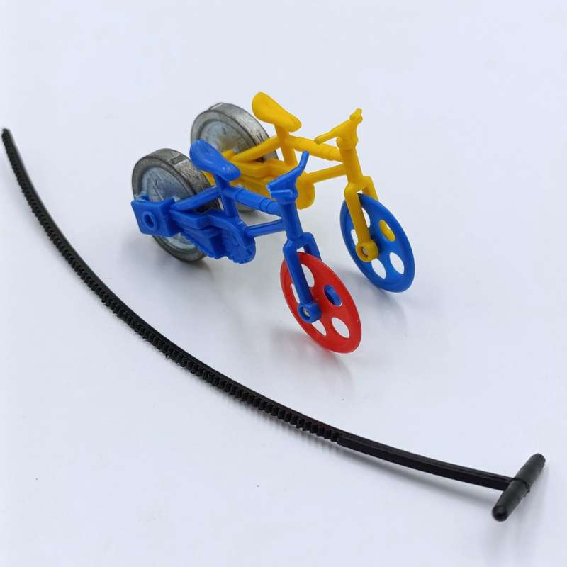 Pair of vintage Pull cord acrobatic bikes with one rip cord - handles broken