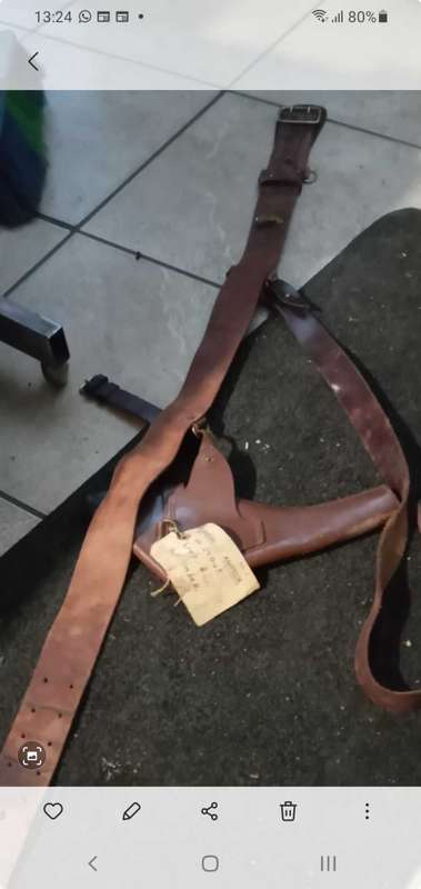 Sam brown belt complete with a luger holster.