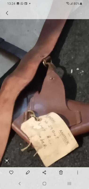 Sam brown belt complete with a luger holster.