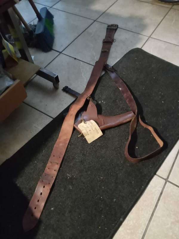 Sam brown belt complete with a luger holster.