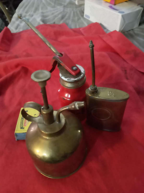 Brass oil cans