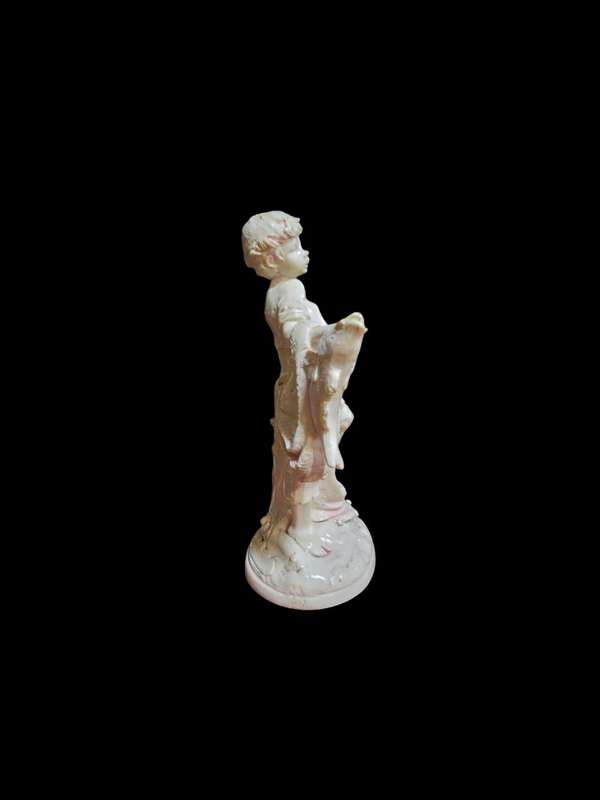 Le Ron stone-lite ornamental display figurine of a young boy