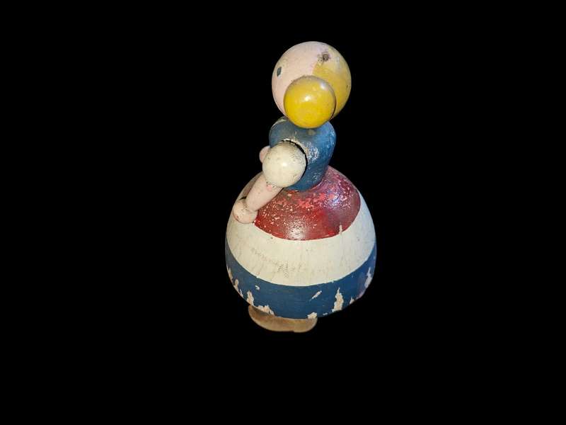 The enchanting charm of Rare vintage doll by Kay Bojesen, measuring 16x8x8cm