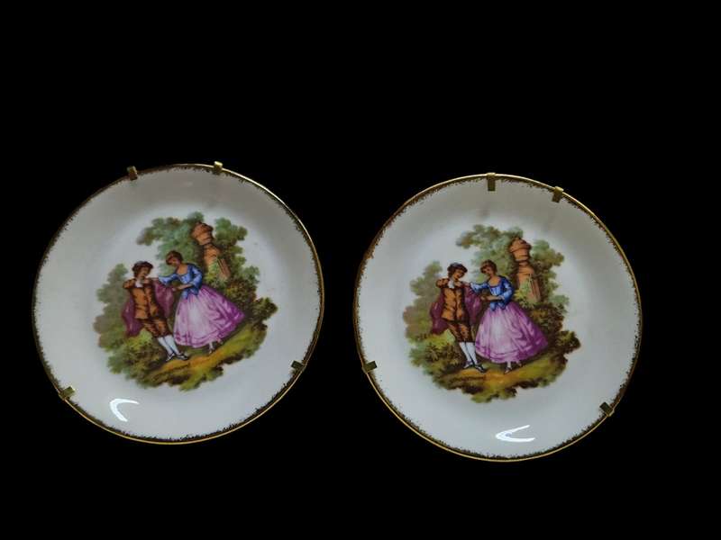 Pair of Goudeville Limoges plates on stands