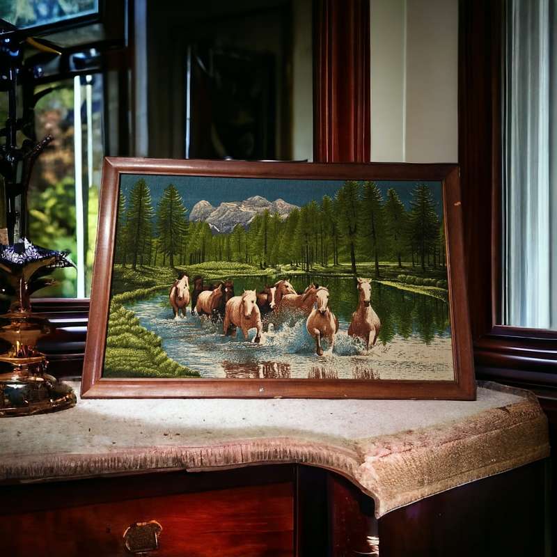 Vintage tapestry in a wooden frame
