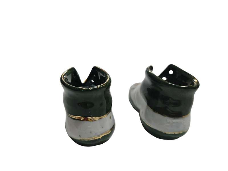 Vintage decorative miniature shoes