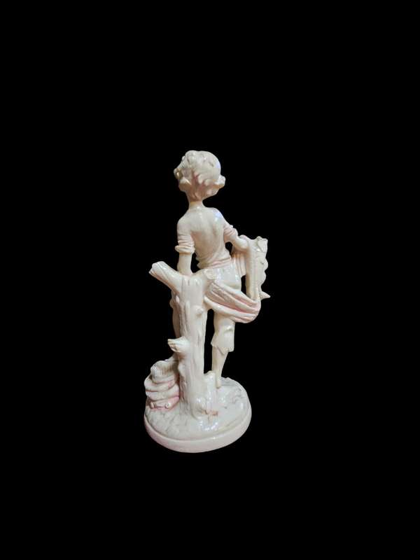 Le Ron stone-lite ornamental display figurine of a young boy