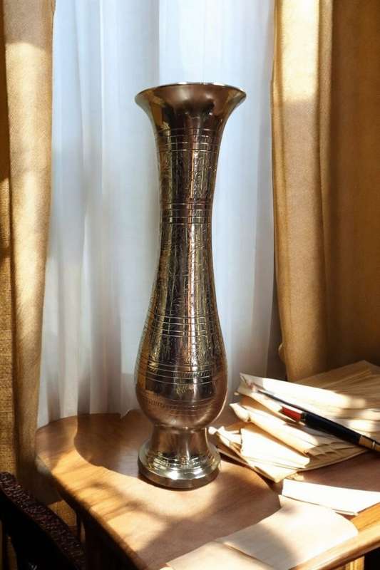 Etched brass vase