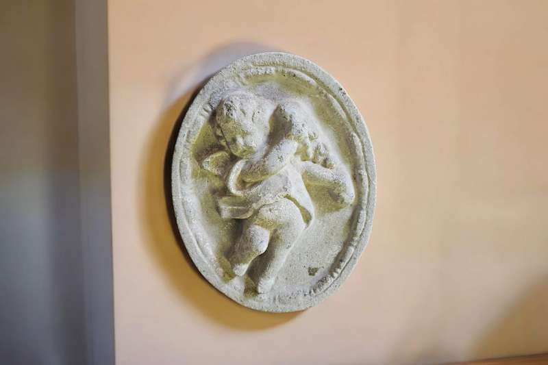 Angel Oval Concrete Wall Plaque, measuring 36x29x4cm