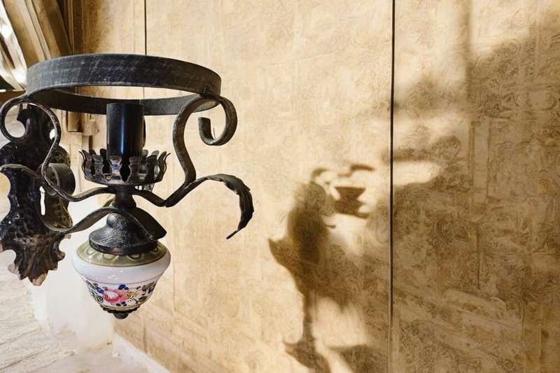Antique Illuminate your space with a touch of rustic elegance with our wooden and metal wall scone