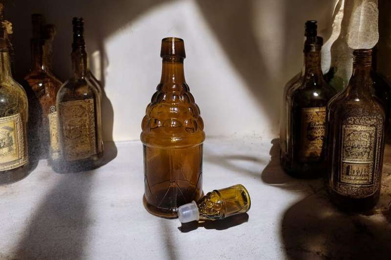 Vintage Amber Grapes and Drum Glass Bottle