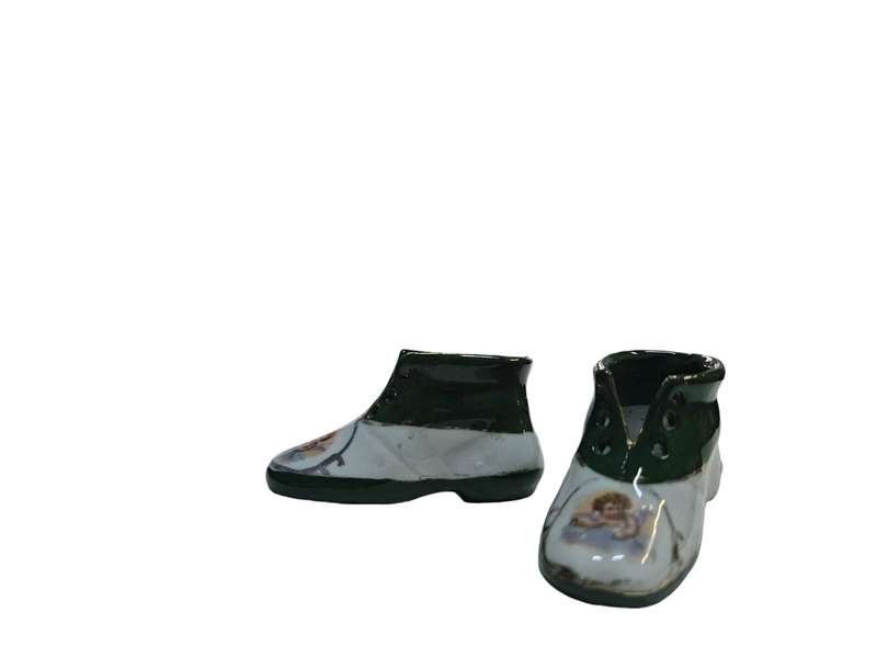 Vintage decorative miniature shoes