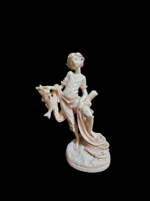 Le Ron stone-lite ornamental display figurine of a young boy