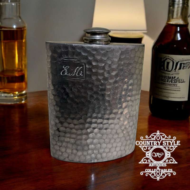 Vintage hammered pewter hip flask