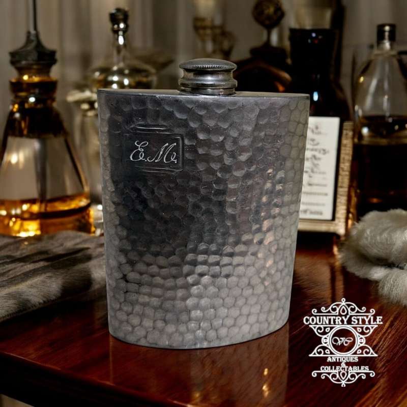 Vintage hammered pewter hip flask