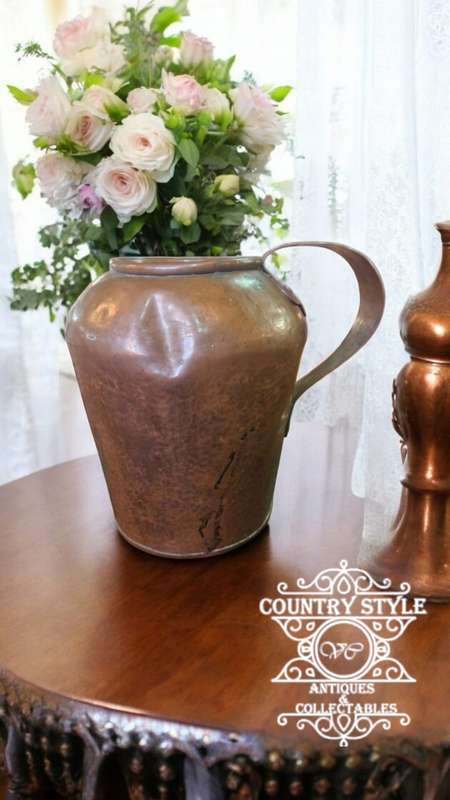 Antique heavy copper jug