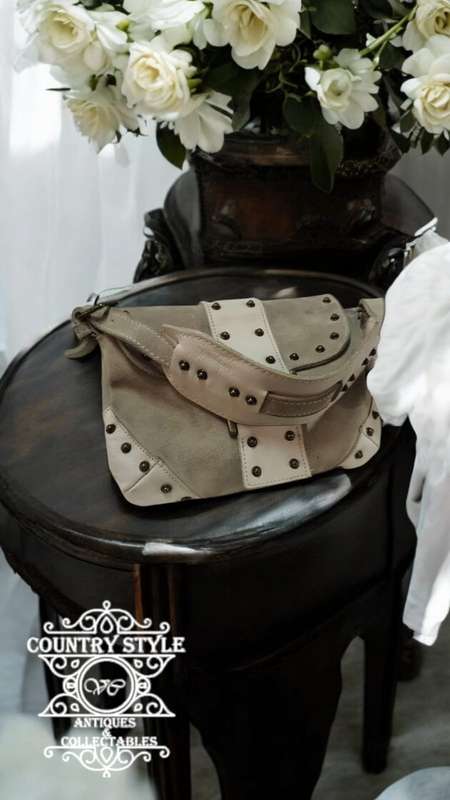 Suede and leather shoulder clutch