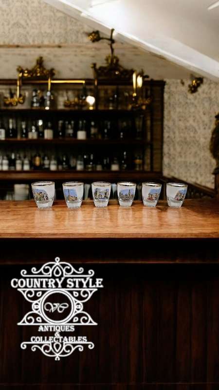 Six memorabilia shot glasses