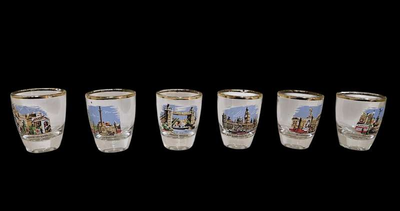 Six memorabilia shot glasses