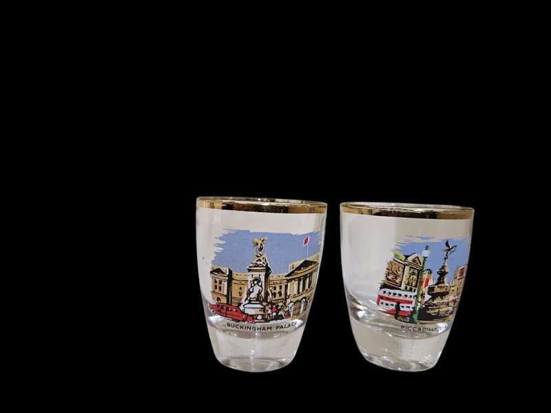 Six memorabilia shot glasses